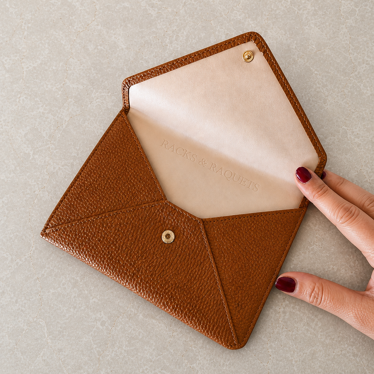 Caramel Racks & Raquets vegan leather mahjong card holder open with debossed interior